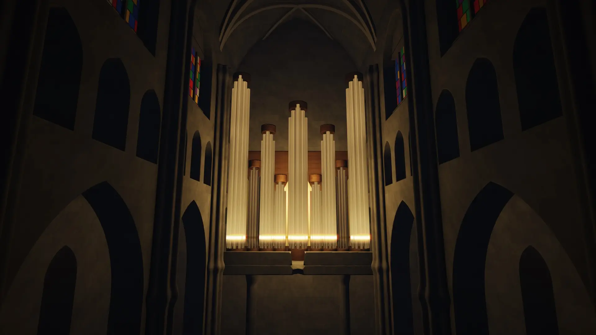 The organ, its pipe towers lit